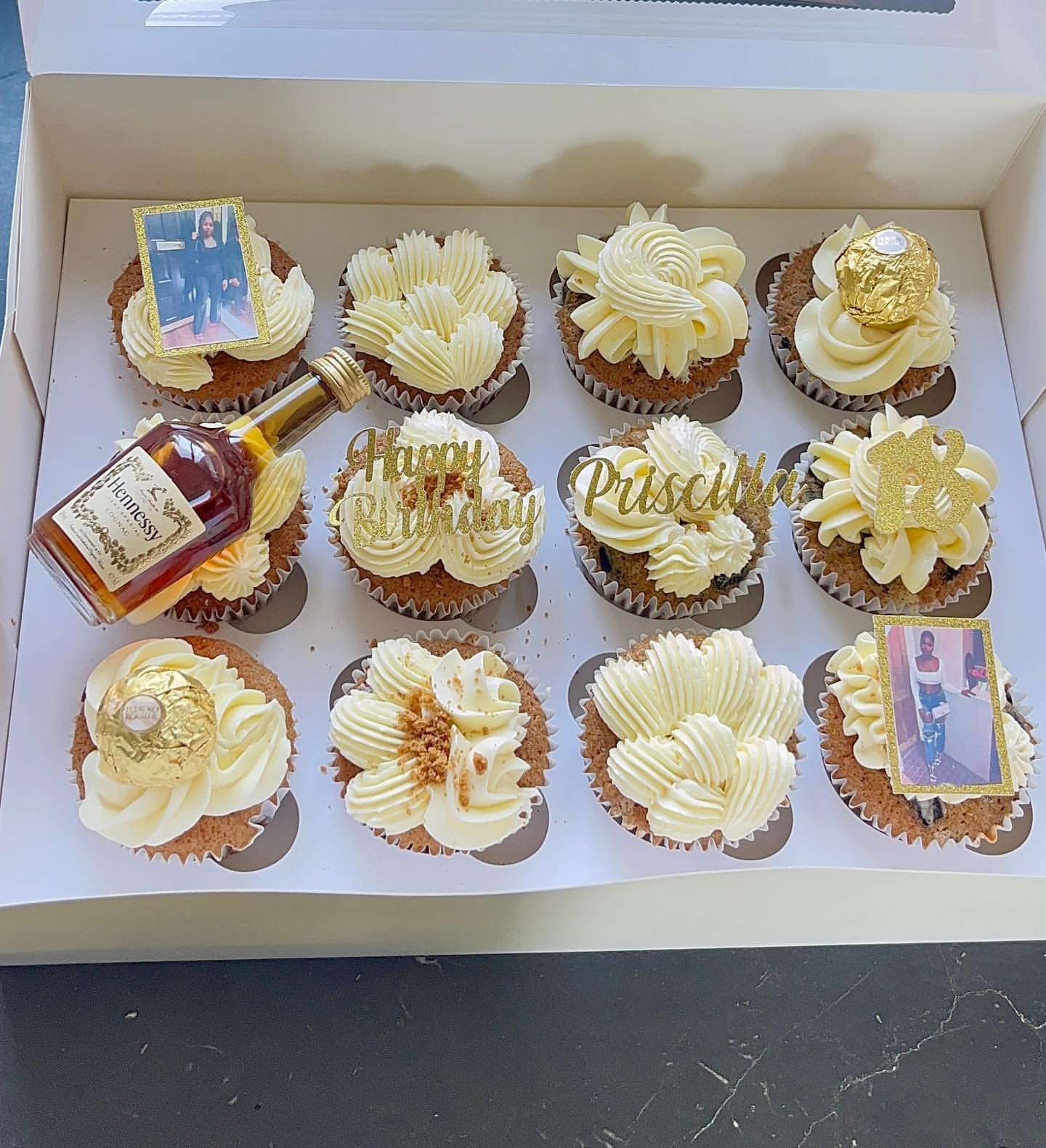 Boxed set of twelve custom cupcakes with gold toppers and edible photo prints